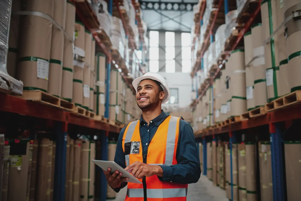 solutions-inventory-man-with-tablet-in-warehouse